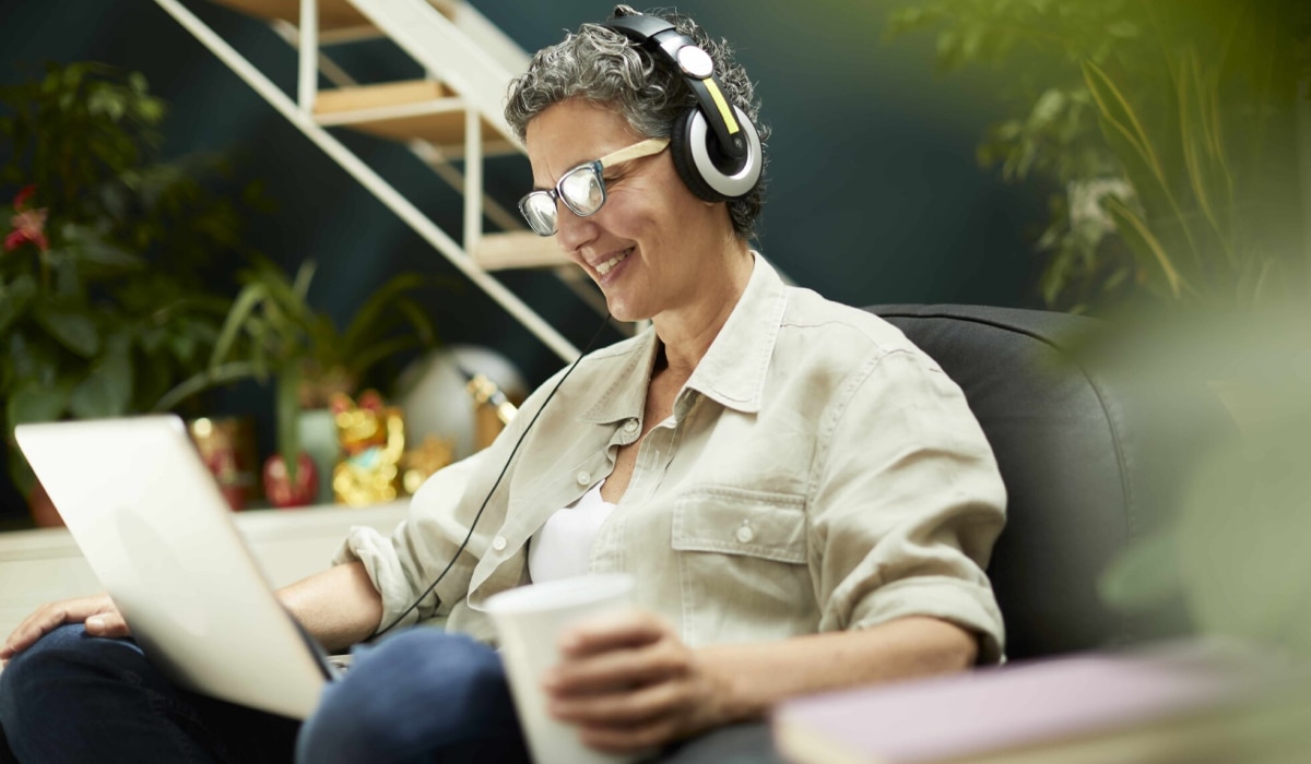 Woman wearing headphones.